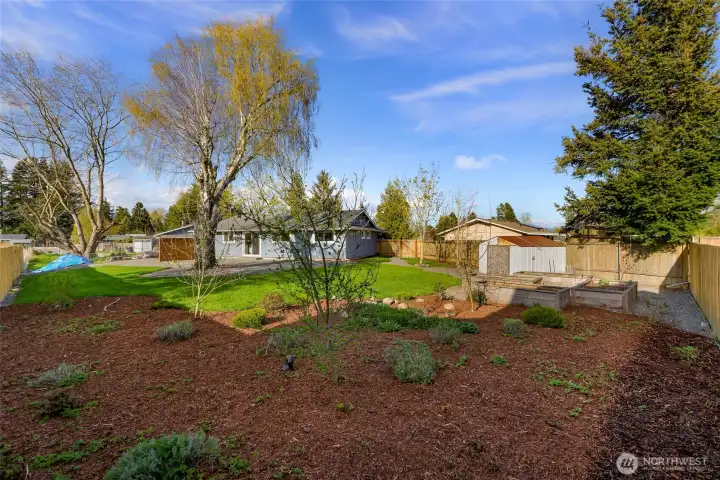 If you love to garden, or just love your space, this is the yard you have been dreaming of!