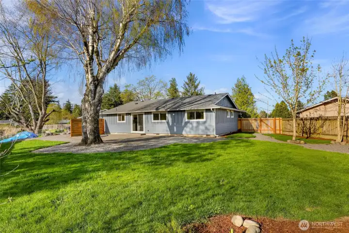 Fully fenced with privacy screening while on the patio.