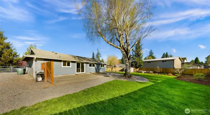 The wide gate provides access to the side yard to store your boat or RV