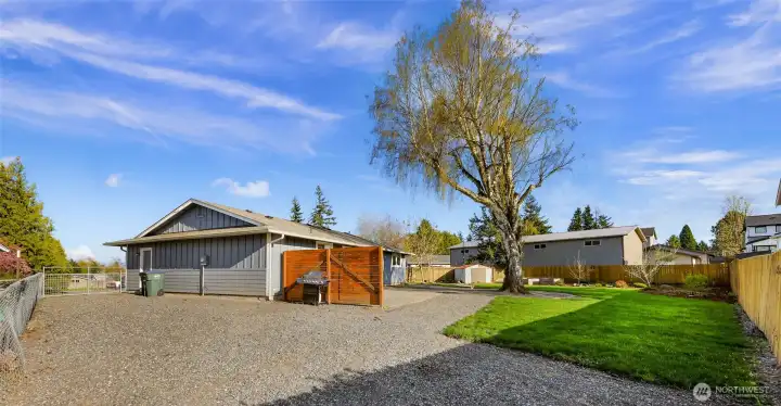 Perhaps the side gate is the perfect access point for a new garage, shop or ADU?  You'd have plenty of yard left to enjoy.