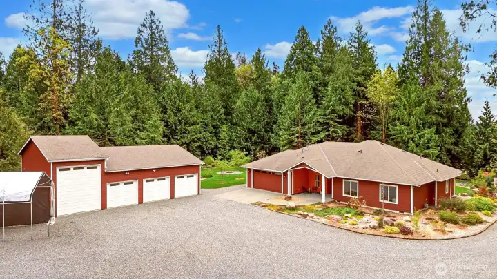 Front of home + 4 bay shop & Covered RV parking
