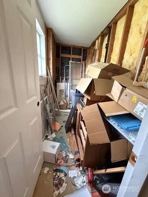 This is a bathroom attached to a bedroom that has not been finished.