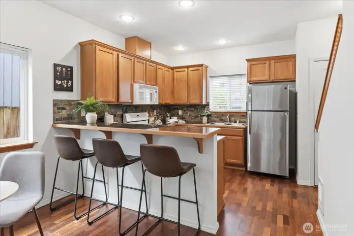 Lovely open kitchen with convenient counter seating!