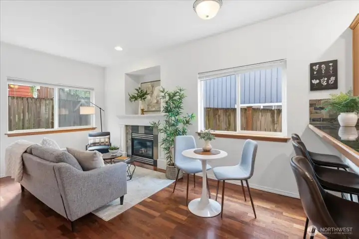 The great room provides ample living room and dining space, and is flooded with natural light