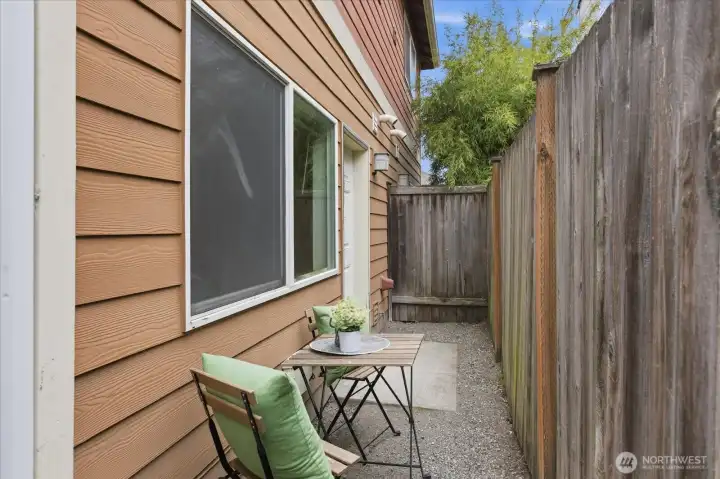 Fenced back patio area. There is also a great front yard area not pictured.