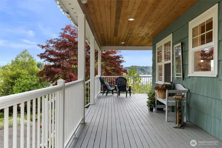 The wide wraparound porch creates opportunities to gather and enjoy the views.