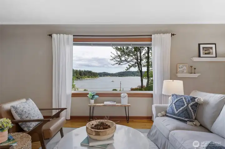 Pretty as a picture, the living room view captures Liberty Bay.