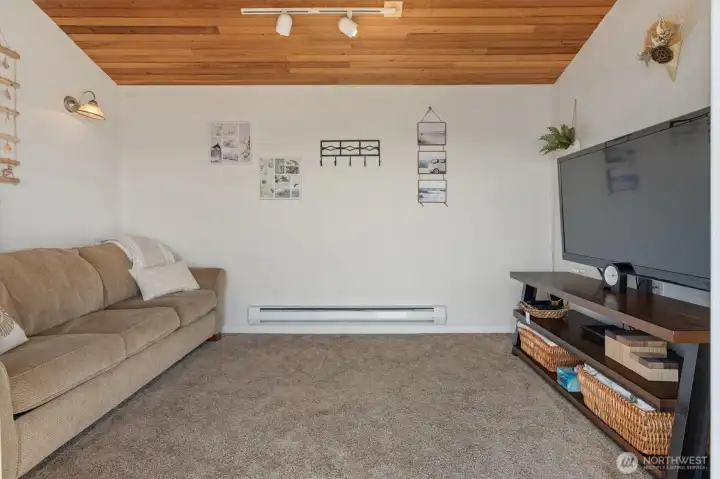 Flexible den ideal for a home office or guest space.