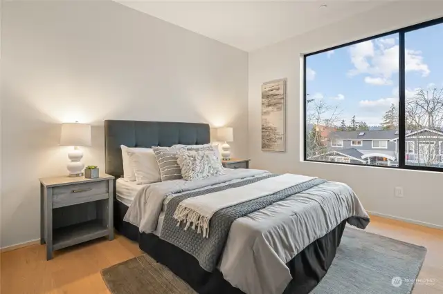 Upper-level bedroom with walk-in closet