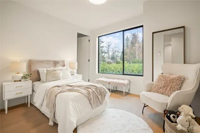 Upper-level bedroom with walk-in closet