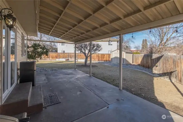 Covered porch in backyard