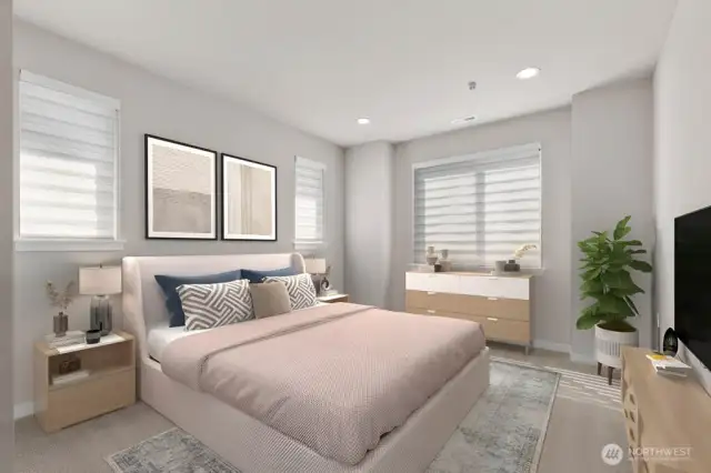 Top floor primary suite has a spacious bathroom as well!