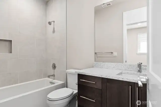 Attached 3/4 bath in second bedroom.