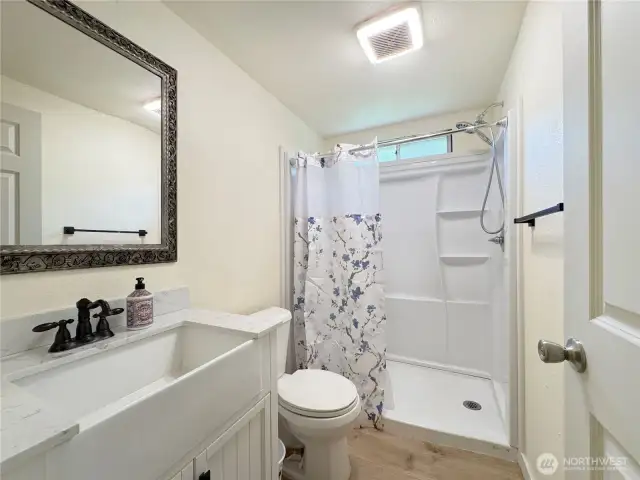 Remodeled bathroom with walk in shower.