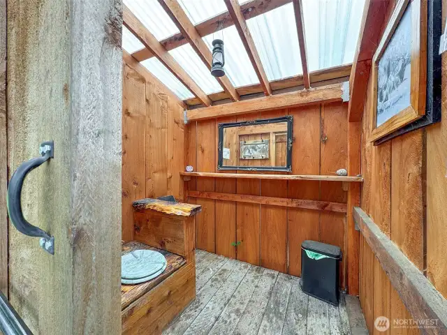 Inside the vaulted toilet.