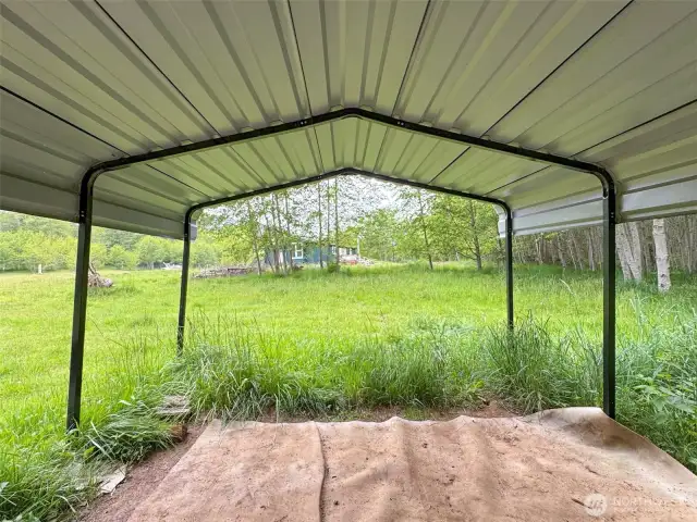 Inside the carport towards the house.