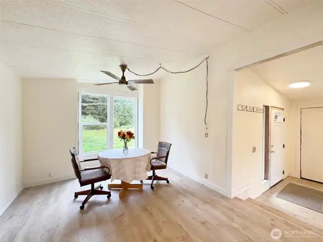 Dining area of the kitchen overlooking front field.