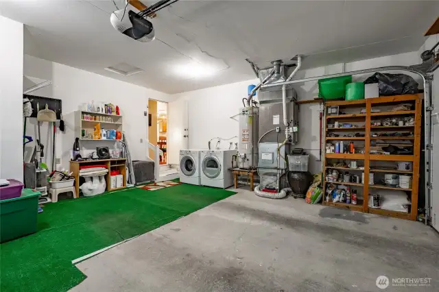 400 sq. ft. 2 car garage with washer & dryer. Gas furnace and hot water tank. Hot water tank is nearly new. new insulated garage door with automatic opener.