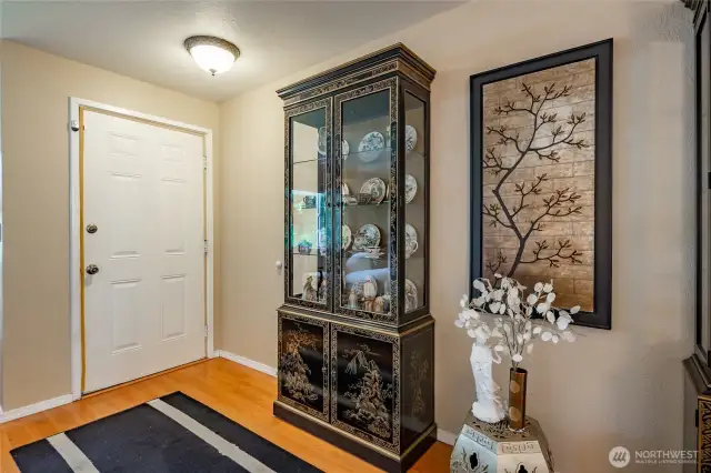 Front entry through a separate glass door and then the main door.