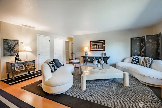 Another view of the living room. Great floor plan with the Primary Suite on one side of the home and two bedrooms on the other.