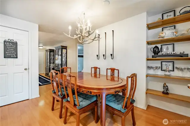 Another view back towards the living room. See pantry in the kitchen.