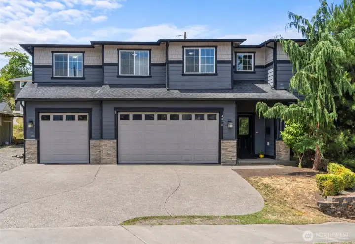 Welcome to your new home just a short stroll from Ruston's vibrant waterfront!