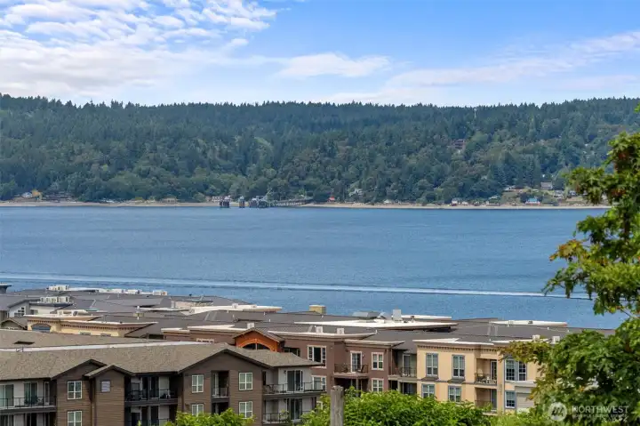 Views of Commencement Bay and Vashon Island from the primary bedroom.