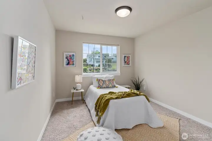 One of the 4 bedrooms located upstairs.