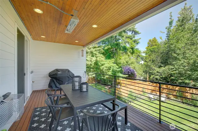 Main floor patio with built-in heater, views of the Cascade mountains