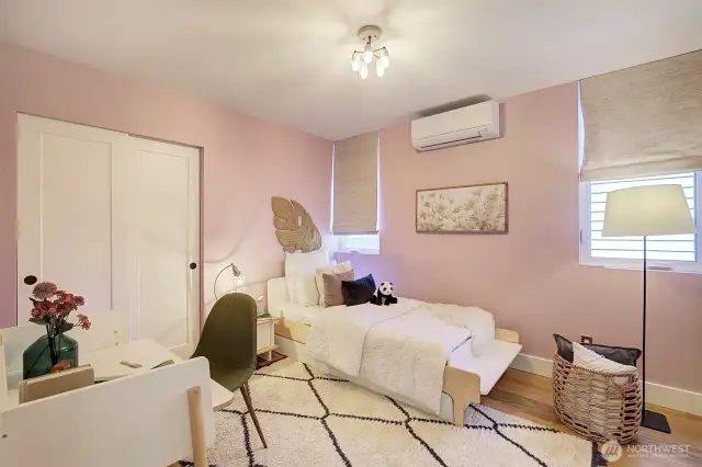 Upper level bedroom #1 with mini-split and built-in closet