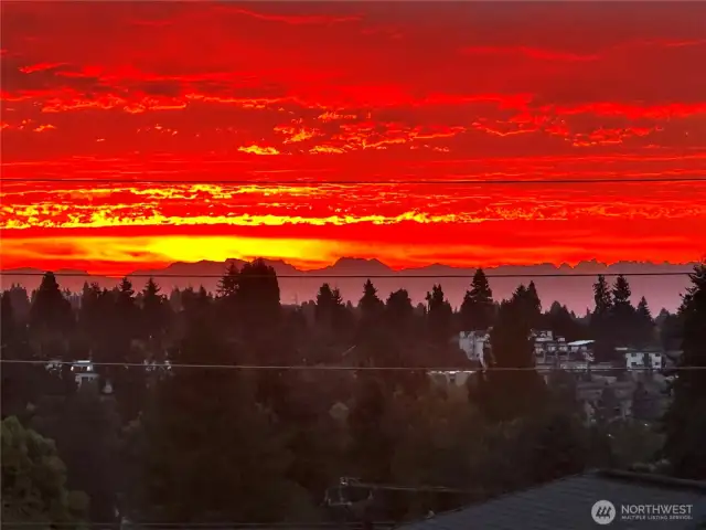 Cascade mountains at sunrise (view from upper floor patio) - picture taken by homeowner