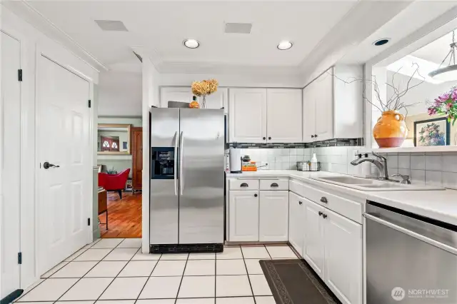 Large pantry to the left and door to downstairs ADU (lockable double door accessibility)