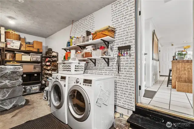 Washer/Dryer on main level in one converted garage space