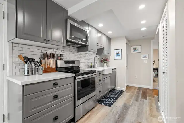 Full kitchen with stainless steel appliances