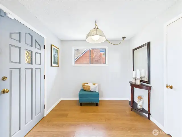 A solid wood front door welcomes you in to this beautiful home.