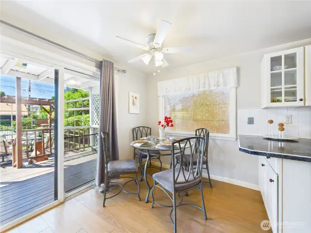 Eating space in the kitchen by the sliding doors makes it feel like you are eating outside.