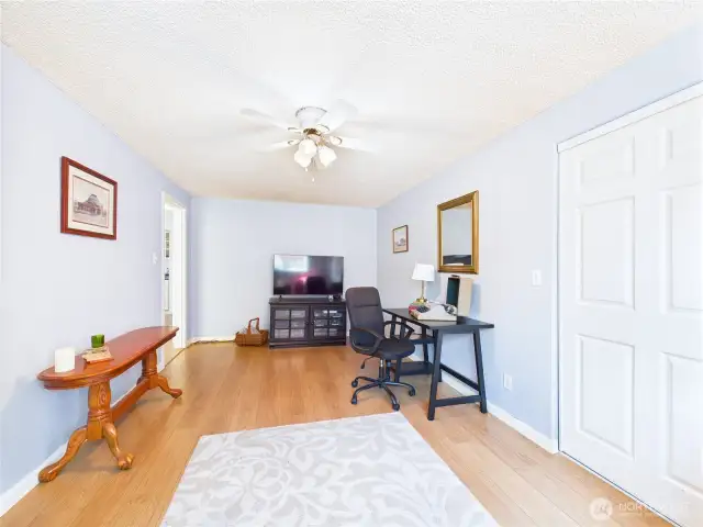 The large first bedroom can be used as a multipurpose room or a bedroom.