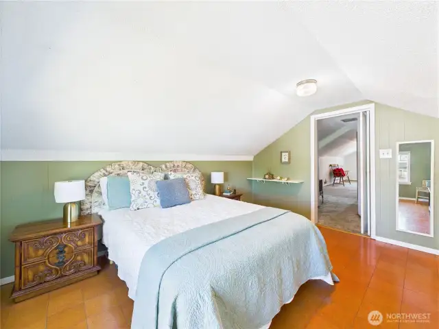 The upstairs has 2 bedrooms. This one is the larger of the two.