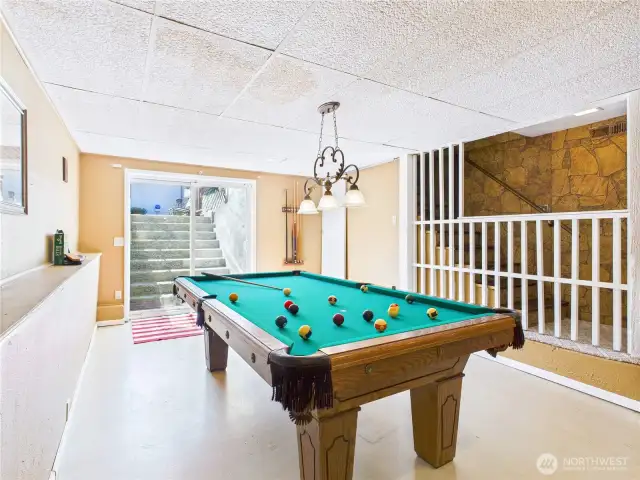 Although this is a basement, the large sliding doors makes it feel otherwise as lots of natural light is streaming in.