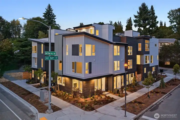 This bold corner home offers striking curb appeal, a private EV-ready garage, and a lifestyle rooted in ease, elegance, and walkability.