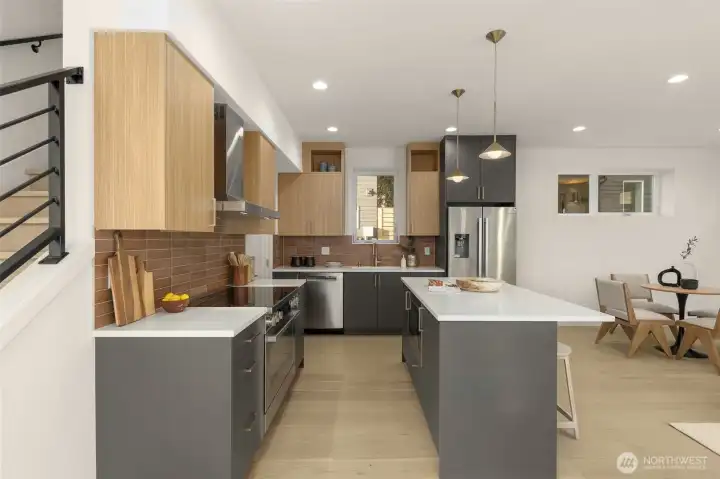 Chic pendant lighting, Bosch appliances, and intuitive flow turn everyday cooking into a joy-filled ritual.