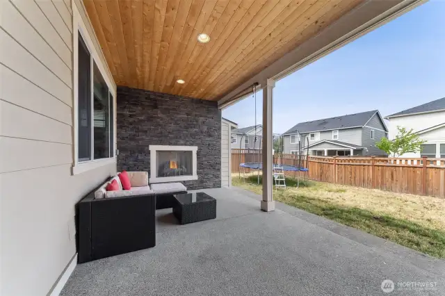 Covered back patio with gas fireplace
