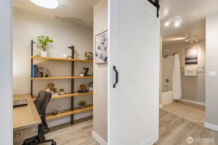 The primary bedroom's walk-in closet has been converted into a fantastic office nook.