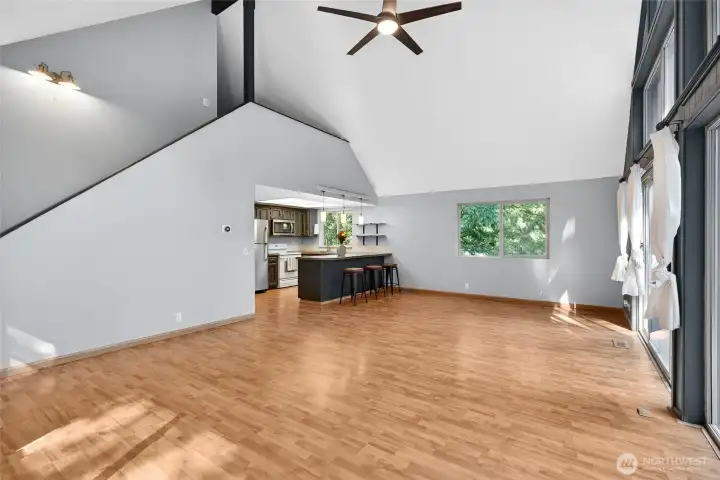 Main dining area and living room w/ vaulted ceilings!