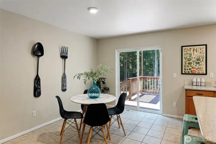 dining area looks out to large back yard