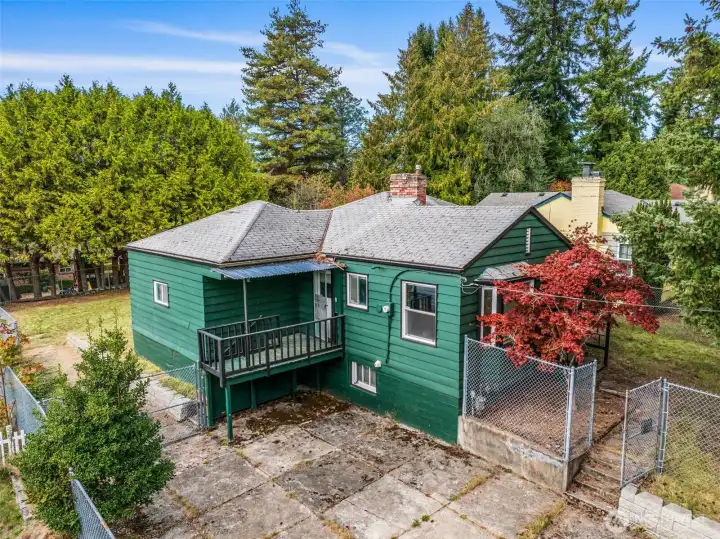 Expansive, level lot offering huge potential for redevelopment or full renovation