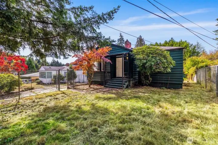 Flat and open yard with excellent buildability—ample room for multiple dwellings (buyer to verify).