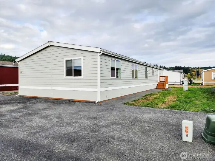 Freshly painted exterior and newly built porches enhance this home’s charm and function. Step up, take a seat, and picture yourself enjoying a quiet morning or peaceful evening right here.