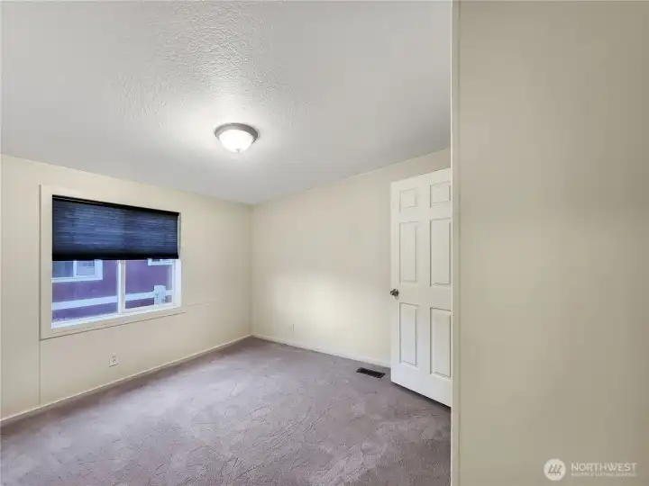 Custom blinds in the bedrooms for style and privacy.