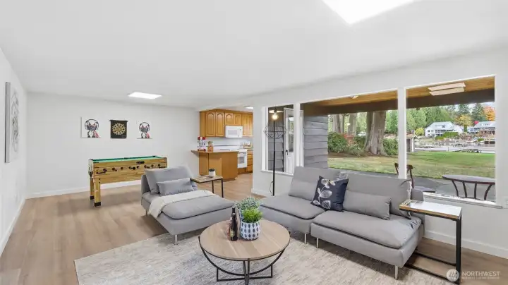 The ideal multipurpose lower level—movie nights, game time, or guest stays welcome.